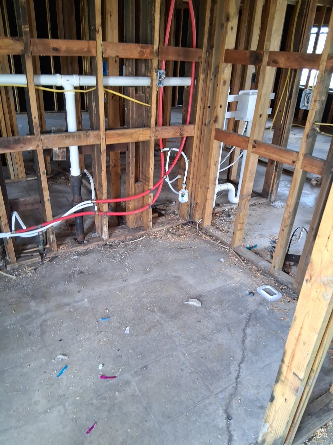 PEX water lines and PVC drains through wall studs