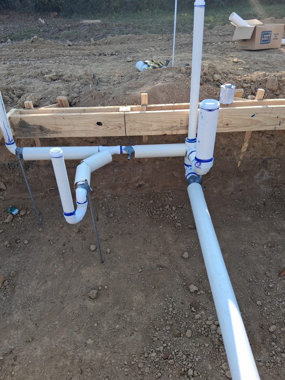 Slab rough-in with P-trap and PVC connections